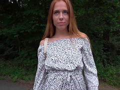 A couple engaged in passionate, traditional sex with a condom.