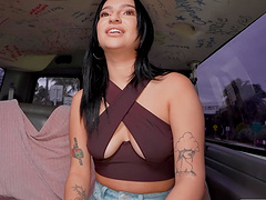 Beautiful brunette gets her ass fucked in a car