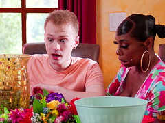 Ebony Mystique bends over and takes a white cock in her pussy