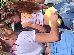 Two girls have an intense threesome experience in a steamy car scene.