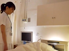 Japanese nurse enjoys while pleasuring a very lucky patient