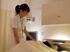 Japanese nurse enjoys while pleasuring a very lucky patient