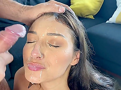 Good looking Bella Rolland gets a facial after sucking a dick