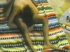 Outdoors interracial amateur retro video with a hot ass ebony girl