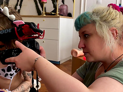 High heel and thong-clad lesbian couple enjoy dildo play