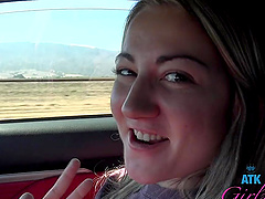 Long-haired Lily Adams gives a sloppy tit-fuck blowjob