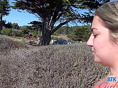 Long-haired Lily Adams gives a sloppy tit-fuck blowjob