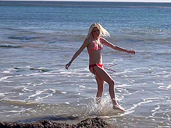 Slender blonde Chloe Foster drops her red bikini to tease. HD