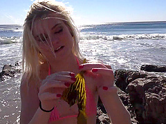 Slender blonde Chloe Foster drops her red bikini to tease. HD