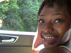 Noemie Bilas moans while getting pleasured in the back of a car