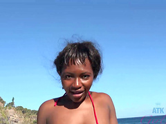 Noemie Bilas moans while getting pleasured in the back of a car