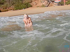 Public beach romp with a bikini-clad beauty