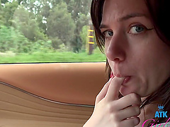 Petite brunette gets her pussy pounded in the car