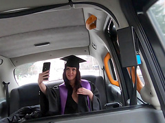 Tattooed hottie gives a sloppy blowjob in a car