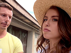 Eden Ivy's long hair flows as she rides in reverse cowgirl