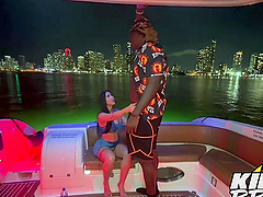 Brunette beauty Valerie Kay enjoys sex with a huge black cock on the yacht.