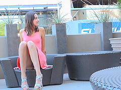 Tattooed babe Roxanna shows off her nice ass in public