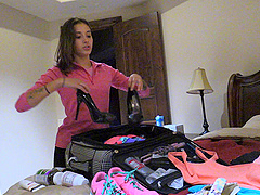 Slim brunette Roxanna shows off her skills in a public backstage solo session