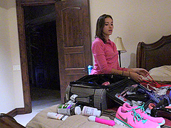 Slim brunette Roxanna shows off her skills in a public backstage solo session