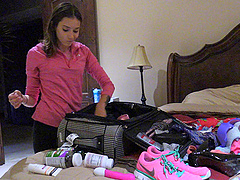 Slim brunette Roxanna shows off her skills in a public backstage solo session