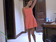 Slim brunette Roxanna shows off her skills in a public backstage solo session