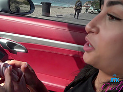Latina beauty Vanessa Moon gets naughty in the car during a sunny day at the beach