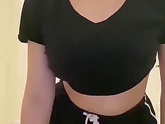 Brunette vlogger shows off her big tits and short hair in solo video