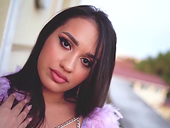 Long-haired brunette in sexy lingerie teases in solo video