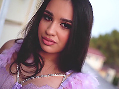 Long-haired brunette in sexy lingerie teases in solo video