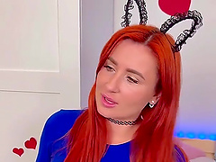Redheaded vlogger shows off her solo masturbation skills on webcam