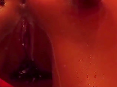 Tattooed babe pleasures herself with sex toys in the shower