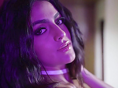 Erotic brunette with long hair shows off her sexy body