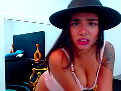 Tattooed vixen Lea Macarney's sensual solo session with natural tits