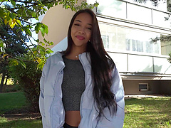 Asian babe gives a sloppy blowjob in the park