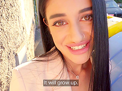 Clothed sex in the back of a car with a hot brunette