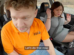 Brunette hottie gives a sloppy blowjob in a car