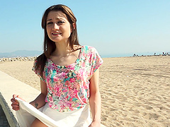 Latina hottie shows off her shaved pussy in a sexy miniskirt