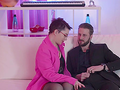 Brunette vixen gives a deep throat blowjob before riding her partner