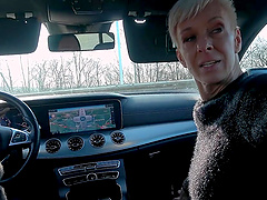 Mature blonde Belinda Bee shows off her leather fetish in high heels