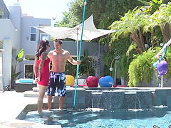 Tattooed hottie gives a titjob in a steamy threesome