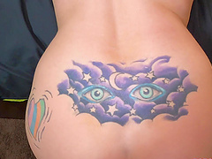 Tattooed milf Christie Stevens gives a hardcore blowjob