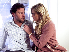 Long-haired beauty rides partner's cock in cowgirl position