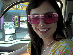 Tattooed brunette Angel Windell gets fucked on the beach