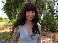 Tattooed hottie shows off her tight asshole