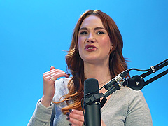 Redheaded beauty gets an orgasm with the help of her fingers.