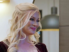 Beautiful woman with long hair undressing and teasing with her panties.