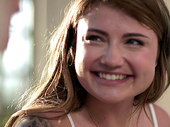 Beautiful brunette gets her pussy licked by a lesbian couple.