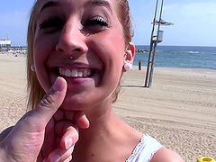 A latina beauty with natural tits gets a facial after a beach blowjob