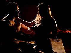 A beautiful woman with long hair seduces her partner with a blowjob.