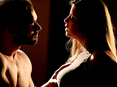 A beautiful woman with long hair seduces her partner with a blowjob.